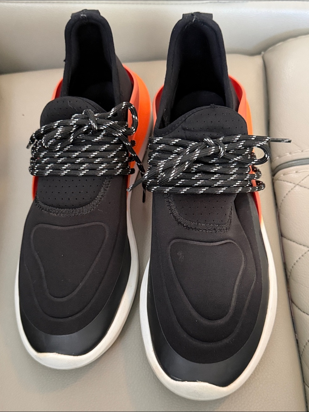 Zara Black Sneakers with Orange Heel Accent